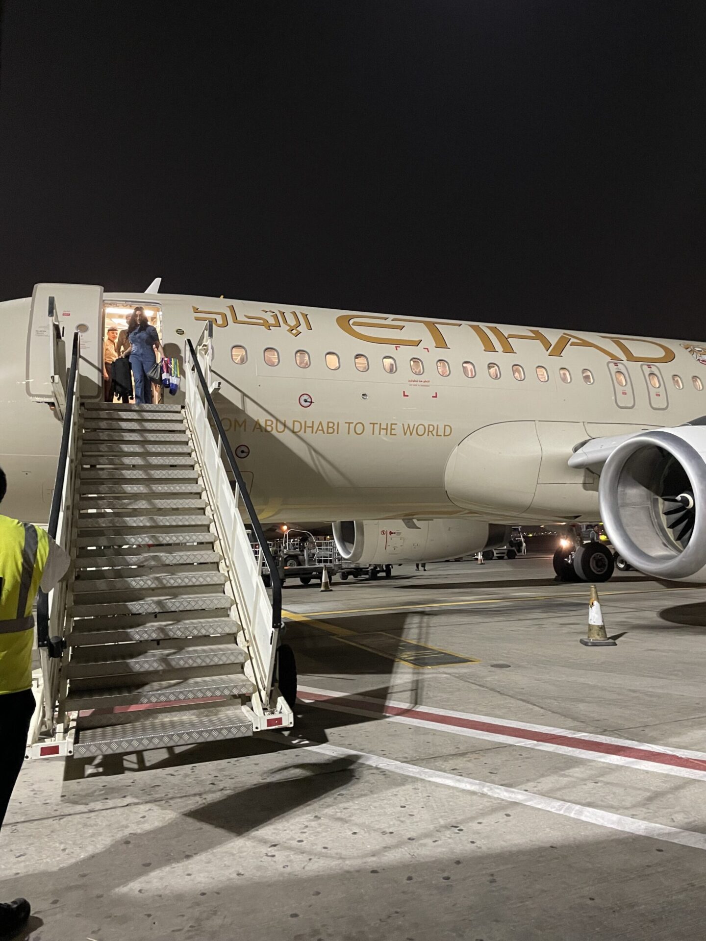 Getting off an Etihad A320-200 plane in Abu Dhabi